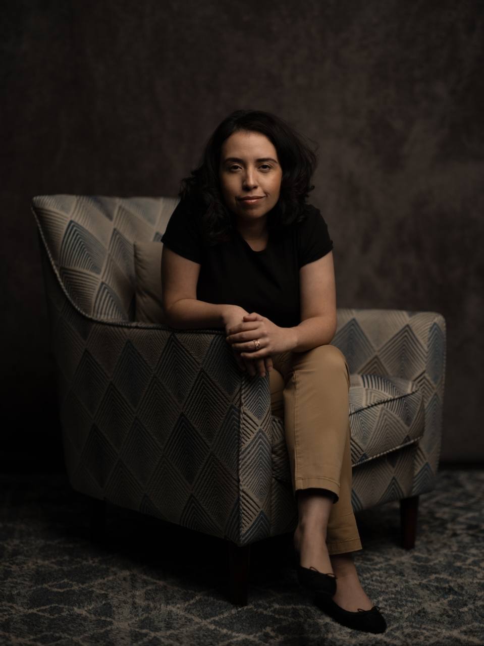 Millie Montgomery seated in an armchair